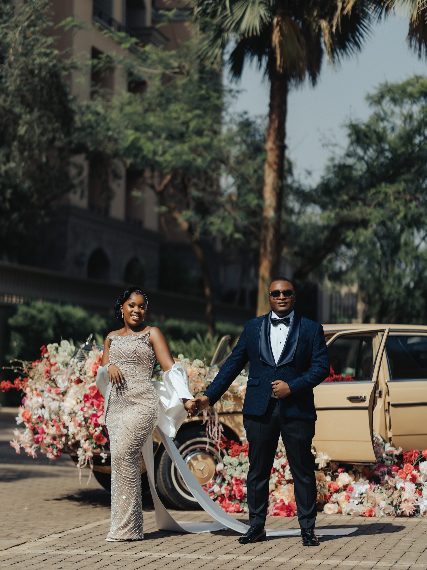 Groom in a bespoke wedding suit tailored by The Looks Bespoke, Kampala